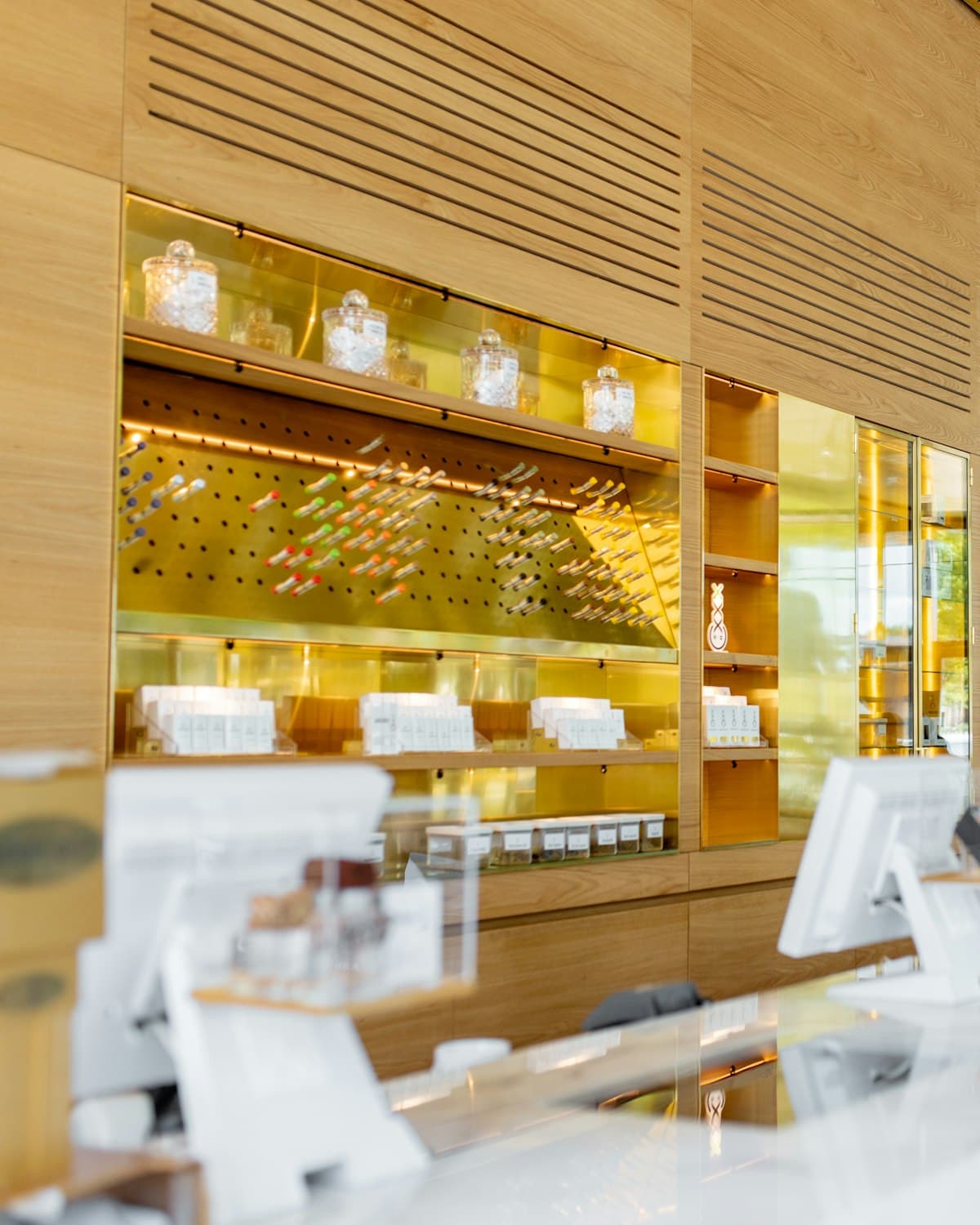 Lit showroom cases at Cherokee Coins and Jewelry displaying coins, gold and silver, and fine jewelry